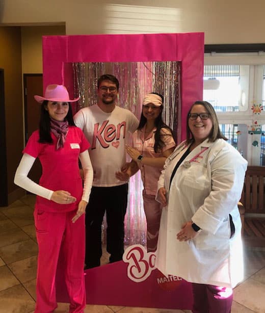 Woodland Springs Vet Hospital staff volunteering at a community event for Fort Worth pet owners
